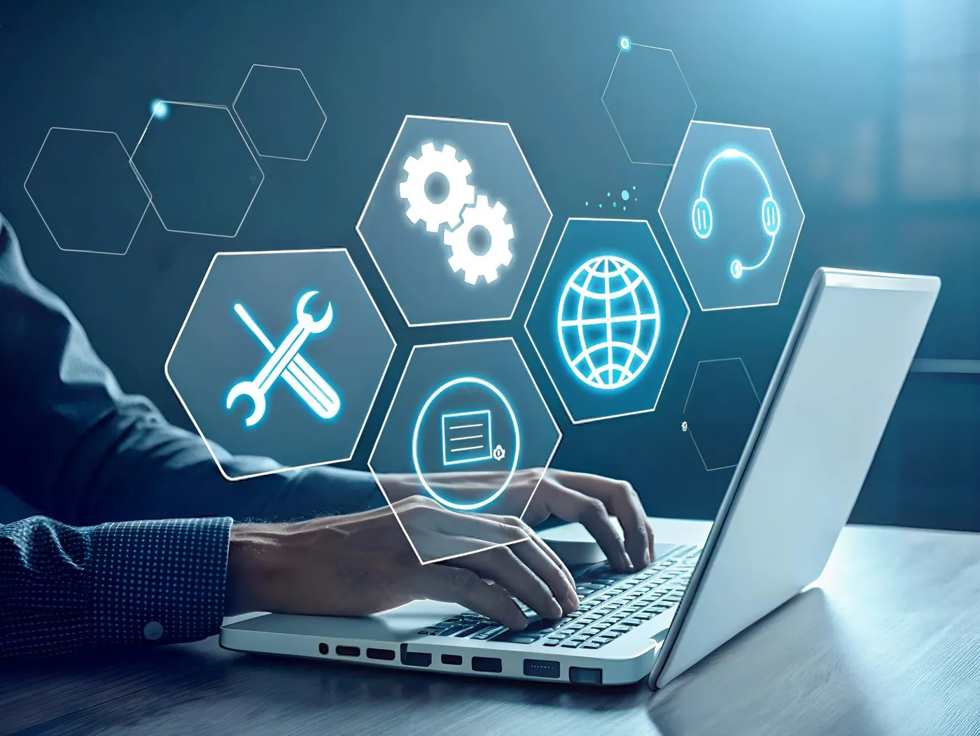 Engineer working through managed IT tasks on a laptop